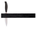 Knivskinne i sortlakeret eg